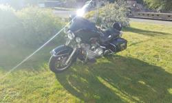 2006 Harley-Davidson Electraglide with only 10,000 kms! Bike has been well kept in garage. New windshield with a mild tint and smoked out signal lights. New aftermarket primary cover. Screaming eagle exhaust system.