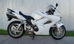 2006 Honda VFR800. $5899. White. V-Tec engine.
Local bike with a clean title. Recent chain and sprockets as well as Michelin Pilot tires.
Included solo seat and center stand.
Buy with confidence from a Genuine Dealership.
Contact Ryan at Daytona