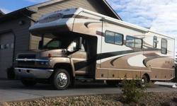 33SS, 33'long, this motorhome has 8.1 litre gas motor with 6 speed allison tranie, hyd leveling system, 2 air units, leather interior, on board gen set, back up camera, ac converter, 19.5 rubber, invertor. Has outside shower, rear hitch and lots of