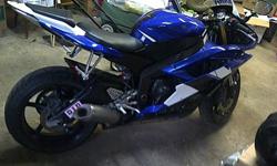 i have a 2006 yamaha R6 race addition bike 4 sale, its in great shape, never been raced, fuel injected, newer tires, new coils and sparkplugs, just installed by yamaha along with complete tune up and adjustments to everything, have some extra parts