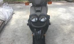 This BWS Scooter has only 4464 Km. and runs like new. Always stored indoors. Peppy reliable and quiet 2 Stroke. Original owners. Recent tune-up. No Motorcycle License Required. Located on Salt Spring Island. Must be seen to be appreciated. Worth the