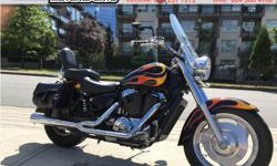 2007 Honda VT1100 Shadow Sabre Cruiser * Nicely dressed! * $5899.
The VT1100 is part of the Honda Shadow family of V-Twin cruisers. This is a very nice example with factory flame paint and very well dressed.
Serviced with new rear brakes, Amsoil synthetic