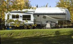 2008 34'Topaz Triple 5th Wheel, Purchased new in 2009. Winter package. 3 slides. Dual pane windows, 2 furnaces, vented attic, heated & enclosed tanks, Triple slides, Fireplace, Free standing dinette & 4 chairs, Queen walk-around bed, huge closets & lots