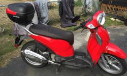 This scooter has 21,000 kms runs very well, computerized display with volts, outside, temp, odometer and 2 trip meters. The scooter has 16 inch wheels, the rear tire need to be replaced soon but is still rideable. The scooter has a few scuffs from the