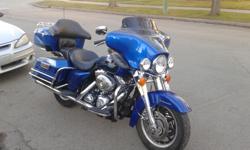 Harley Davidson Electra Glide Classic. Beautiful Cobalt Blue Pearl paint. Rhinehart exhaust, Hog Tunes amp and speakers, trailer hitch and oil cooler. Well maintained oem tourer with a lot of good miles left in her. A back injury is forcing me to sell my