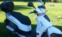 LOW kms ~~~ ONLY 3,338 kms
-- 125 cc
-- 160 KMS ON 5.5 LTRS OF GAS
-- CAN RUN HWY SPEEDS UP TO 100kms
-- UNDER SEAT AND REAR LUGGAGE STORAGE THAT DOUBLES AS A BACKREST FOR PASSENGER...ALSO EASILY DETACHES.
-- NEEDS NOTHING...RUNS GREAT !
-- $1800