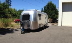 We are selling our 22' Safari Sport travel trailer. We bought it in July 2014 from California and have since upgraded it with many options normally found on higher-end Airstream models including the front corner SS stone guards, double deep-cycle