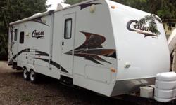 294 RLS Cougar travel trailer, 1/2 ton towable, Polar package (has been in -10 no problem), 7000 lbs when fully loaded weighed on hwy scales, 2 new golf cart batteries, commercial grade foam mattress on queen bed. Fantastic fan. Flat screen TV. Full