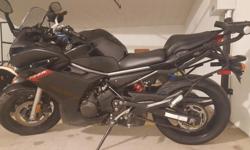 2009 Yamaha FZ6R. Perfect bike for touring or around town. Includes full luggage set (Kappa side cases and Givi top box) and magnetic tank bag. Comes with stock windscreen as well as aftermarket Madstad touring windscreen (nice for longer rides). 26,000