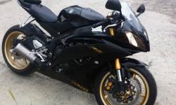 2009 yamaha R6, never been dropped, the bike has; Flush mounts turn signals, Under tail led light and Custom rear plate mount. Only 5650 km the bike Runs mint!
Low ballers will be ignored
