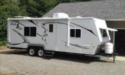 4 Season trailer, winter package includes insulated tanks and tinted dual pane windows. Front queen bed, sofa couch, booth dinette, rear bath, A/C, large awning. Trailer dry weight 5475 lb. (8000 lb. GVW). Trailer also comes with RV cover. One owner