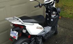 white 2012 yamaha bws 50cc scooter
gas powered - $4 to fill up every few weeks
insurance also cheap about $1/day
safely rides 2 people
storage in seat for a couple grocery bags or fits helmet
only 5000 kms on it used lightly for 3 years
a couple scuffs