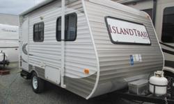 Please call Dean to schedule your viewing!
ISLAND TRAIL - Where high end looks and features meet affordability. Residential style furniture and two toned walls add comfort and warmth. This very clean, new-to-you RV is perfect for the family with the