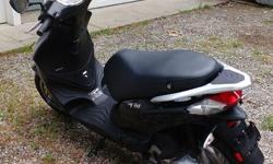 2014 Italian Piaggio Fly Scooter, 4 stroke 50cc motor, 1.7 gallon fuel tank. 117 MPG, only 1400 km, like new. $1500.00 Firm