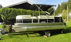 In awesome condition and virtually like new and easily seats 10 people; depending on weight! It has a 60 hp mercury motor with low hours and cruises along nicely. As well as a Lowrance sonar, Fusion stereo with many speakers, bimini & cover, playpen