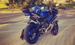 2015 Yamaha r6 for sale, has Yoshi slip on pipe, fender eliminator and integrated tail light, only 3000km on it, selling because I'm upgrading to a litre bike.