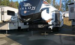 Price: $74,950
Stock Number: 833208-4136
VIN: 1UJCJSBV3J18B0180
Interior Colour: walnut
This Jayco Talon fifth wheel toy hauler features a 13' cargo garage that is separate from the rest of the unit. You will also find a bath and a half, a complete