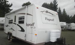 mint condition 23 foot , 3800 pounds dry , air ,awning ,maxs air covers , walk around bed , rear bathroom.