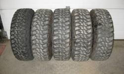I have a set of 5 tires for sale. Four(4) are used and one is brand new. I would say the used ones are around 50%. They are the old style Goodyear Wrangler MTR with an 'E' rating. Selling as a set.
 
The second photo shows the comparison between the new