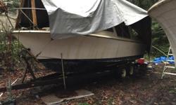 Reposting with pictures and price drop.
I have an early 70s 26' planing hull boat that I'm told is a clone of the 26' Tollycraft, but it is lighter and is designed as a pure planing hull (as opposed to the semi-displacement hull of the Tollycraft).
