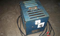 LOOK, REDUCED BY 50 DOLLARS. THIS BATTERY CHARGER WAS BUILT AND DISTRIBUTED IN 2004 BY INDUSTRIAL BATTERY ENGINEERS OF CALIFORNIA, (IBE). IT IS 110 VOLT INPUT, 50-60 CYCLES AT 10 AMPS DRAW. THE OUTPUT IS 28 VOLTS DC AT 28 AMPS, CAN START AT 40 AMPS FOR A