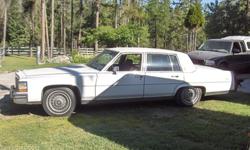 Classic 1988 Cadillac Fleetwood Brougham, 4 door sedan in perfect condition. Absolutely no rust (never has had any), car comes with 6 rims, 8 tires plus the unused original spare. Built in radar scanner. Has a 307 motor, great on gas, way better then the