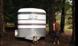 2002 Thuro Bilt 2 horse angle haul trailer, good tires, brakes and floor. Some surface rust that I was going to clean up, but haven't had a chance.
I just don't use it enough and could use the money on upgrading the footing in my paddocks. Trailer weight