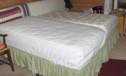 2 twin beds extra long c/w box spring, will make king together , will sell separate at $ 60.00 each ,plus frame s OBO