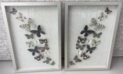 These two vinatge shadow boxes display butterflies. Each is a work of art in lovely earth tones with the occassional splassh of beautiful colour within the wings. They measure 16" wide x 24" tall. There is minor scuffing to the frames (mostly on corners)