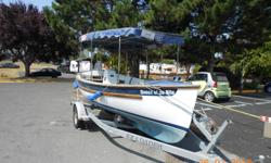 Canadian Transport Canada Registered electric boat -A Duffy boat made under the trade name "Shock." This boat was the harbour ferry in Ganges Harbour, Saltspring for years. 38 Volt Electric DC motor powered...belt drive to shaft.
Boat needs love and