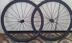 Surplus to my needs: FarSports 38mm x 25mm Carbon clinchers. Novatec hubs, Sapim spokes (20F/24R) 1450g +- 30g, shimano cassette body 10/11 speed. Skewers, spacer and rim tape included. Aprox. 500km on rims, paid $499.00 US(645.00CAD)four months ago.