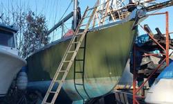 This site won't allow me to post more than 2300 characters so call for more info.
The short version
Hull was built in 1998 by folkes, previous owner completed, including epoxy the inside of the hull before spray foam. The mast and boom were built and