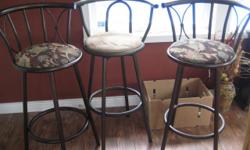 3 bar stools two with pattern seats and 1 plain.
$25.00 each or 3 for $65.00