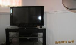 Plasma TV in very good condition, glass shelved corner stand