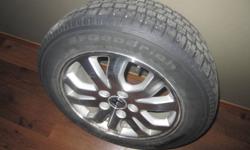 4 x P205/60 R16 91S M+S BF Goodrich Winter Slalom tires with about 8/32" tread depth remaining on Honda alloy wheels.