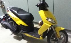I have a brand new Aprillia Sportcity, and by brand new i mean it has 1.5 kilometers on it, bought it right from the manufacturer, and i just have had no time to get my M licence, and have lost interest. it also comes with a cover, helmet, and gloves.
All