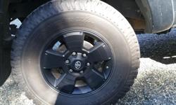 LT 285/70R17 tires taken off of a 2015 Toyota tacoma. Four tires have about 30000km on them, maybe about 70% tread left on them and one tire is a spare so it is brand new, never used. I have a quote from cedar tire for 4 brand new tires totaling $1800