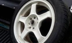 I am selling my 16'' 5 spoke white rims. The bolt pattern is  4 100 and 4 114.3. The one has some slight curb rash a few small chips but in over all very good condion. How ever they do not have center caps. They were on my 92 honda prelude but will fit