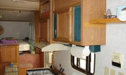 21'6" Terry Resort
 2way fridge
3 piece bath
4 burner stove/oven
queen bed 
sleeps 6
extra high roof line
price reduced everything works