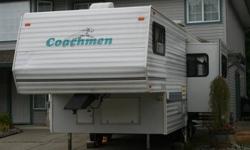 1996 24 ' coachman catalina 5 th wheel trailer for sale in excellent condition.has 8 ' slide 15 ' awning large fridge with freezer 3 burner stove with oven;microwave; air conditioning, queen size bed 3 piece bathroom 2 new 30 lbs propane tanks laminate