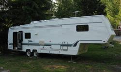 Citation Supreme 5th Wheel 36 ft long, 2 slides, winter package with dual windows, heated holding tanks. 3 piece bathroom with full size shower, large 3 way fridge/freezer. TV and washer/dryer Samsung 2 years old.
This is a perfect unit to live in year