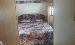 Canadian made and In clean and Great Condition, sleeps 4.
Comfortable Queen and pull out queen sofa.
Oak cupboards and trim
Living room slide with table and chairs.
Walk through bathroom
Shower with tub
2 skylights
Polar Pack
Overall perfect size and