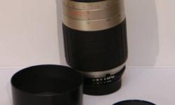 Phoenix 70-300mm 1:4.5-5.6telephoto zoom lens for Nikon mount AF,
with front & rear caps, hood, & HOYA 63MM Skylight filter, Great autofocus lens, no flaws.