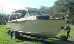 1986 Starcraft Islander 221. 21 feet Aluminum with a 4 cylinder Mercrusier inboard and alpha one outdrive. Full canvas top with side curtains and travel cover. Tandem axle trailer with electric brakes and electric winch. Comes with 7.5 hp kicker and