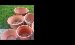 8 plastic Plant pots for only $ 10.00. less than half the original price Pick up from 152 St. with 34 Ave South Surrey. If you are interested PL call me at 604-930-1203