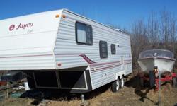 1999 27.5 ft Jayco Eagle 5th Wheel in absolutely beautiful condition.....Great family trailer, with all the emenitys of home including flat screen TV and a surround sound stereo,portable DVD, fridge, stove , oven,furnace, shower with tub,Air