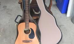 Samick acoustic guitar. As pictured.