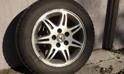 Bridgestone Blizzak 16" tires mounted on Acura OEM alloy rims off 2000 Acura TL. 
Rims are straight and true.  Finish is in good over-all shape with moderate cosmetic blemishes.  Tires have lots of tread left on them.