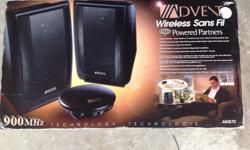 New Advent Wireless Stereo Speakers still in box. Range is up to 300'.
