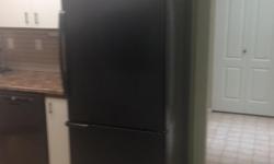 Amana fridge/freezer in great condition. Fridge is approx 14.5 cu. ft and freezer is 6.5 cu. ft. Black in colour